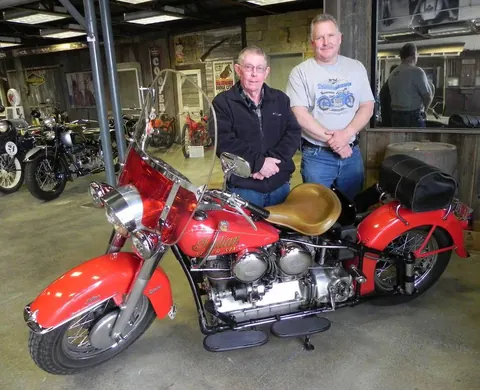 Museum owner Kelly Modlin with a restored Indian