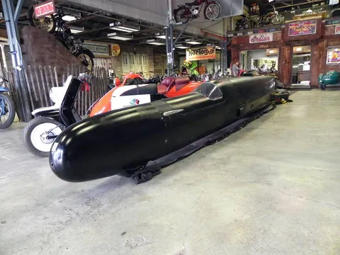 Streamlined black record-style motorcycle