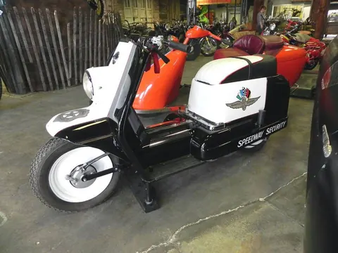 Orange and white vintage scooter