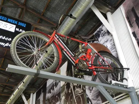 Vintage bicycle hanging in the rafters